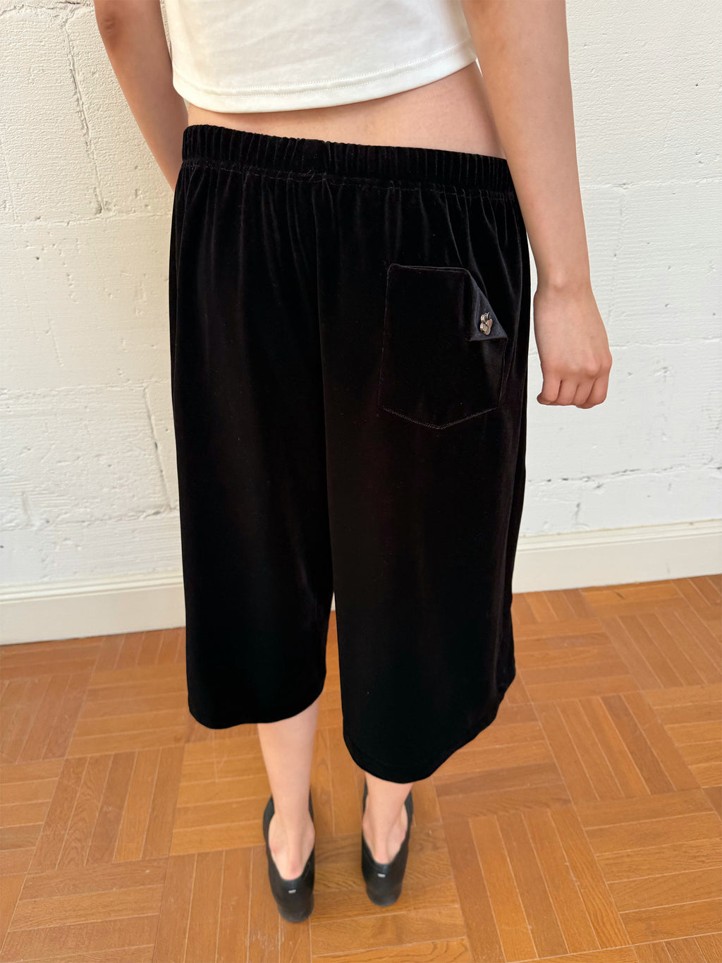 Embroidered black velvet shorts