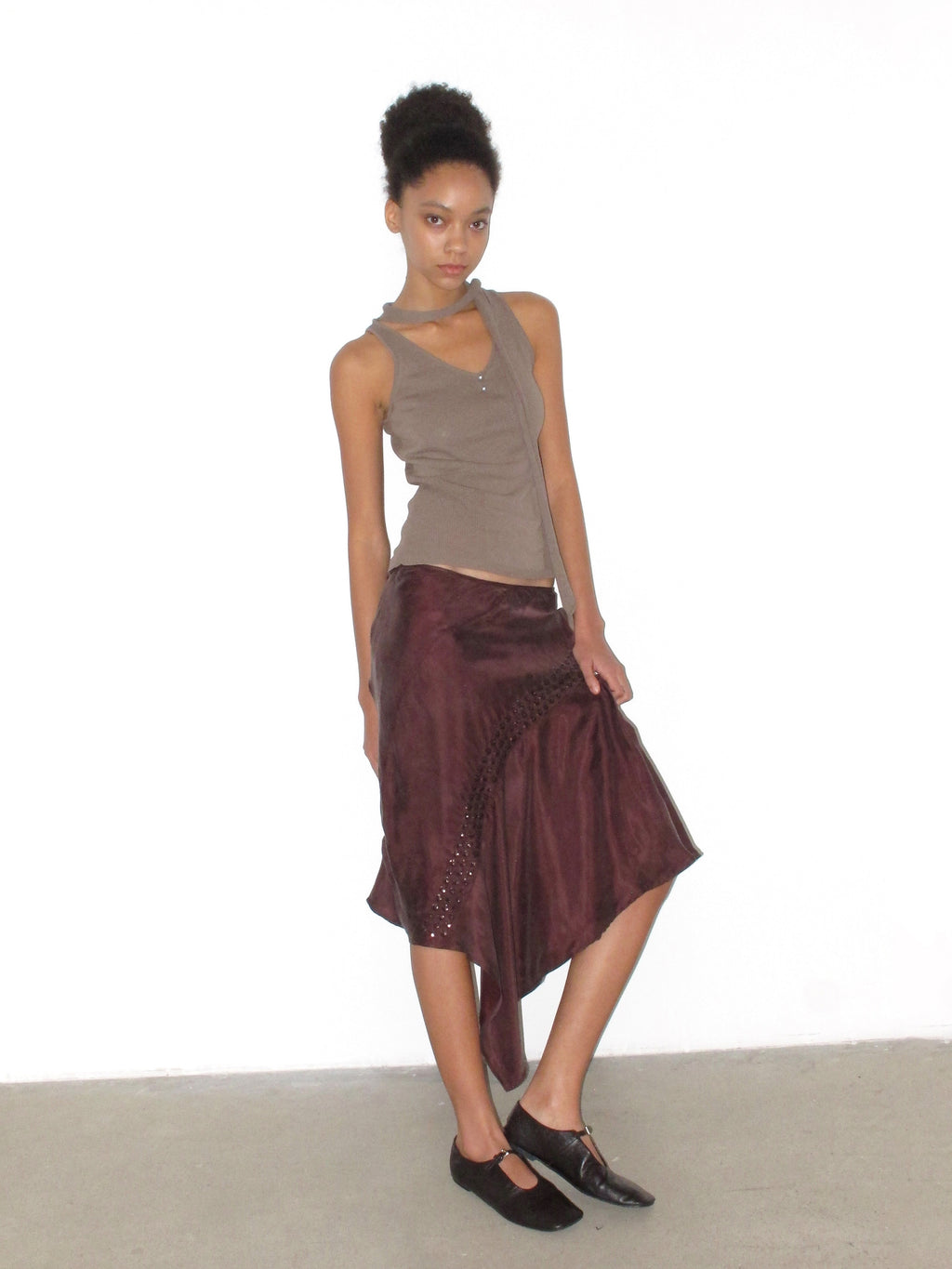 Irregular side slanted skirt
