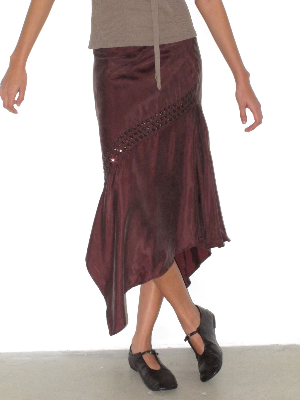 Irregular side slanted skirt