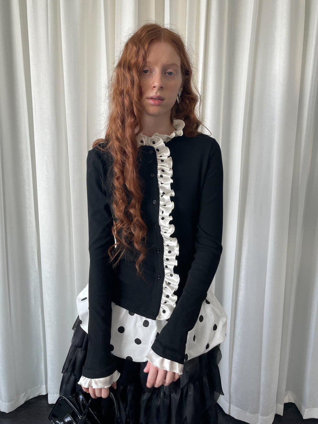 Knitted cardigan with polka dot lace