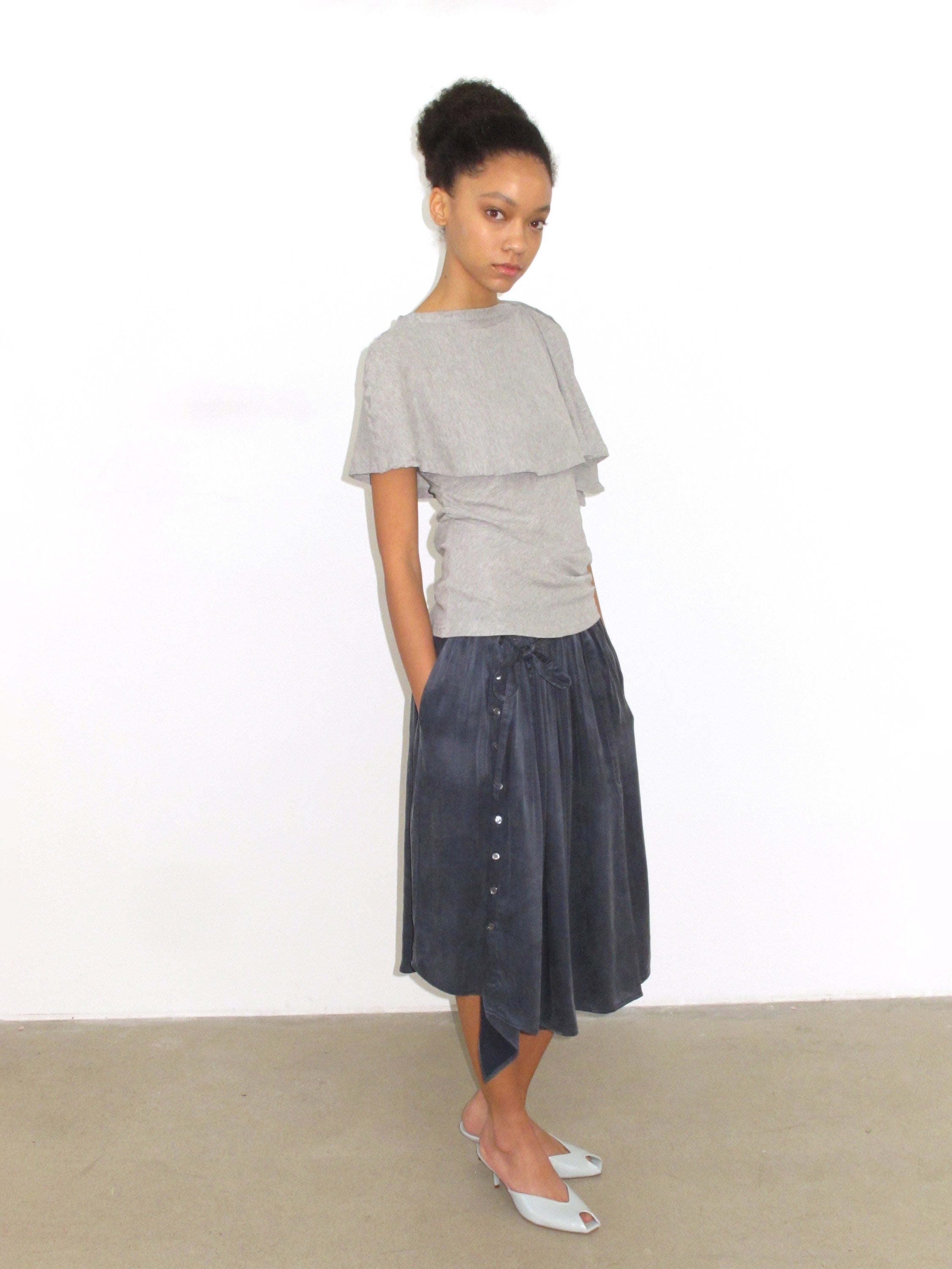Multi-button high slit drape skirt