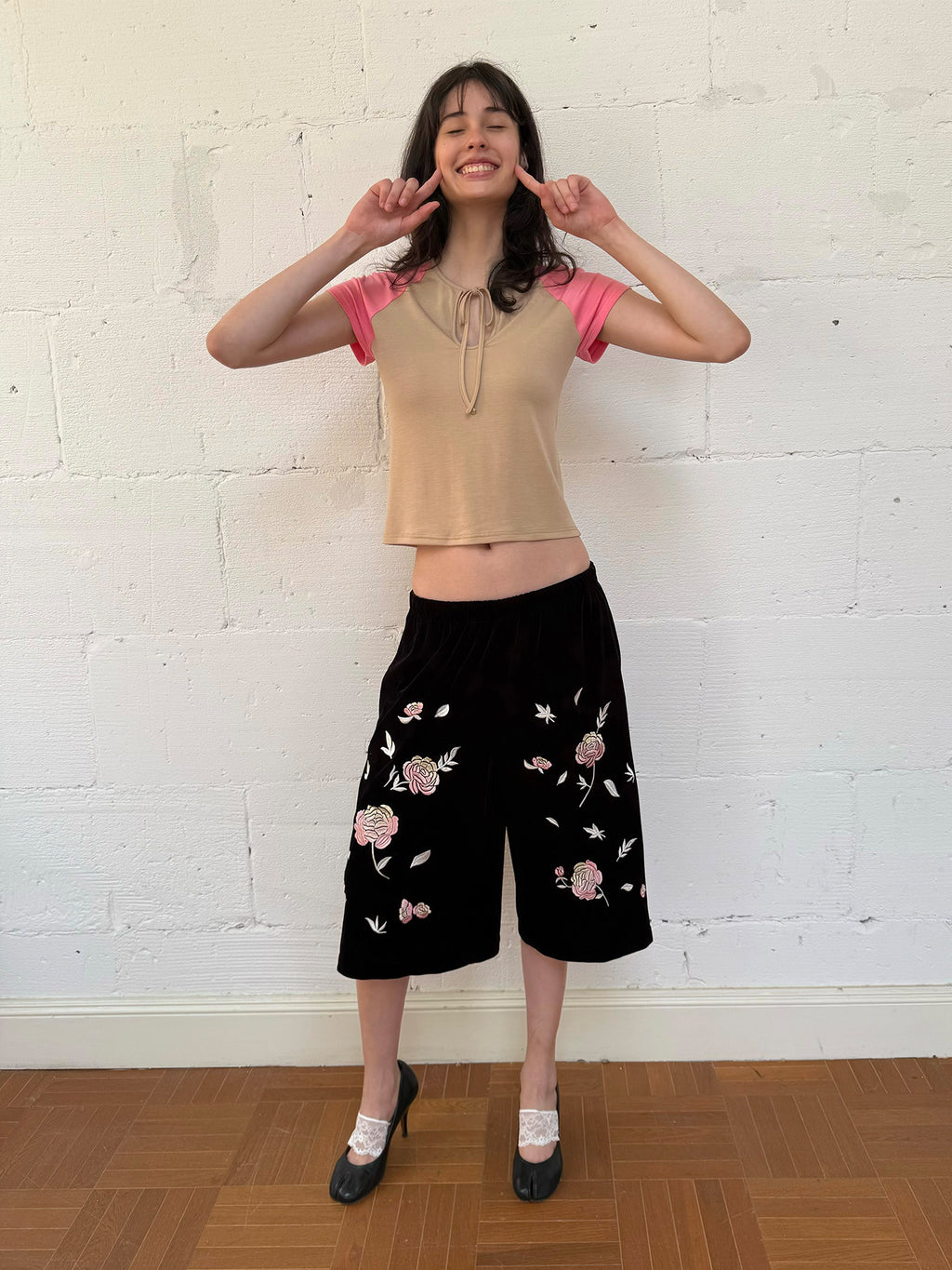 Embroidered black velvet shorts