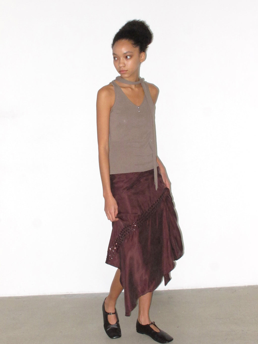 Irregular side slanted skirt