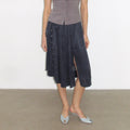 Multi-button high slit drape skirt