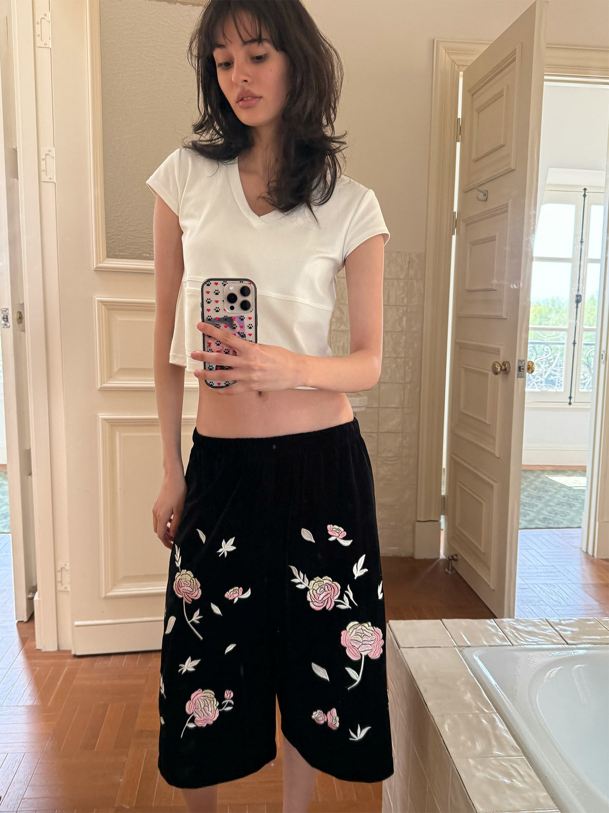 Embroidered black velvet shorts